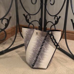 White and black leather purse